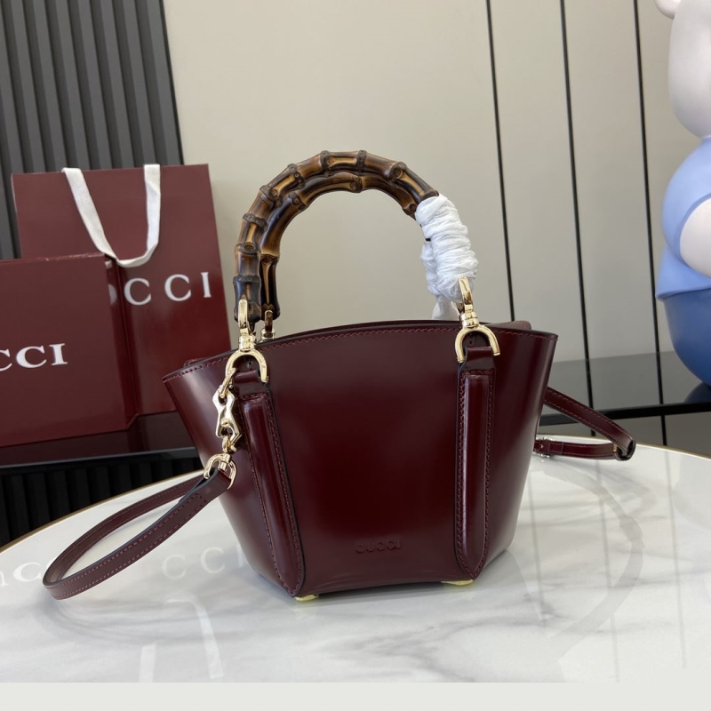 G*u*i top handle bags